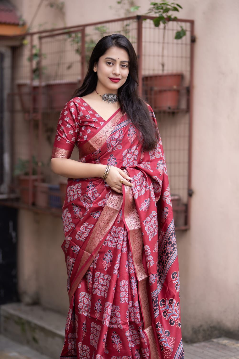 Maroon Soft Cotton Silk Ajrakh Printed With Gold Zari Border Saree