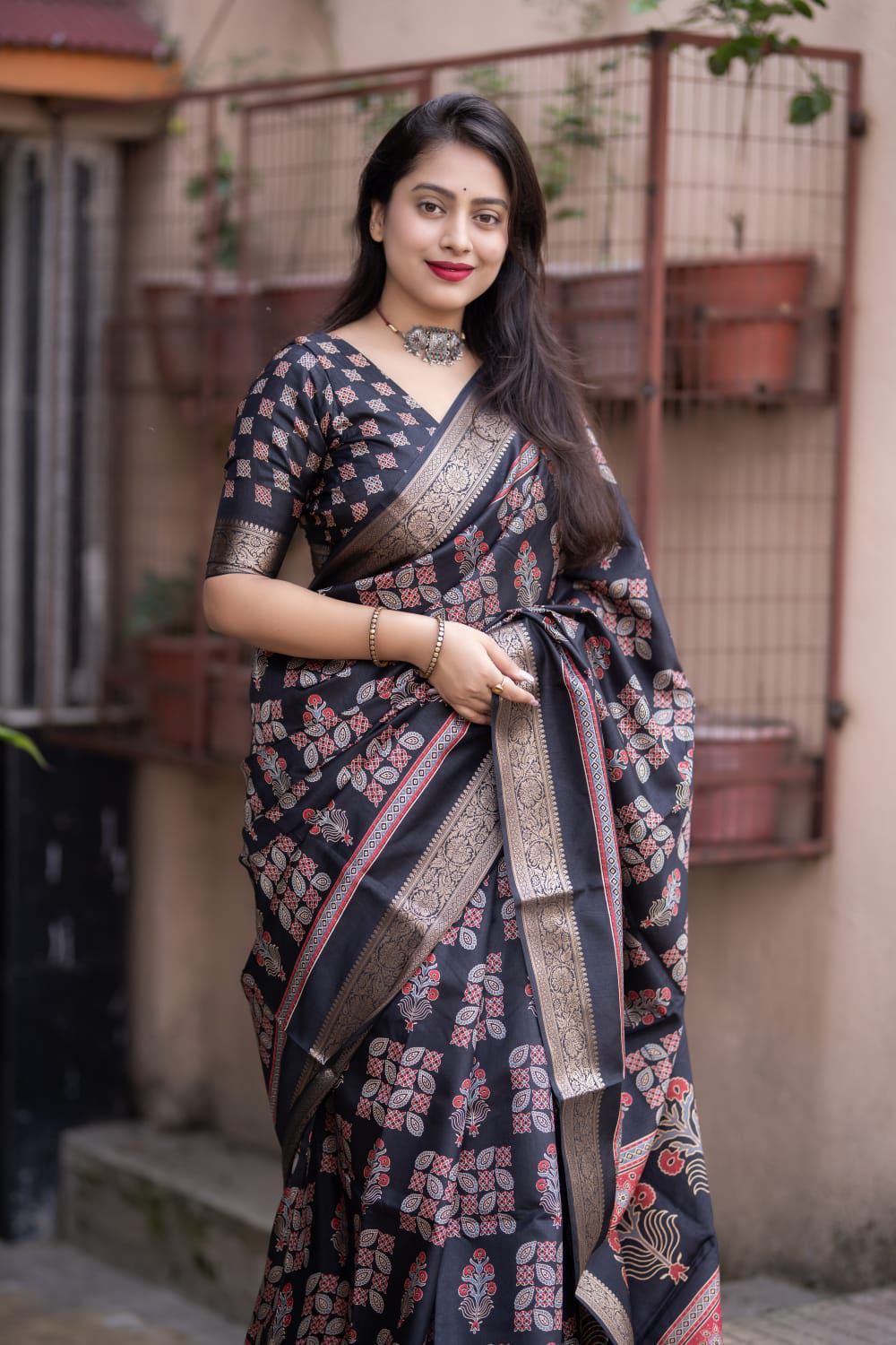 Black Soft Cotton Silk Ajrakh Printed With Gold Zari Border Saree