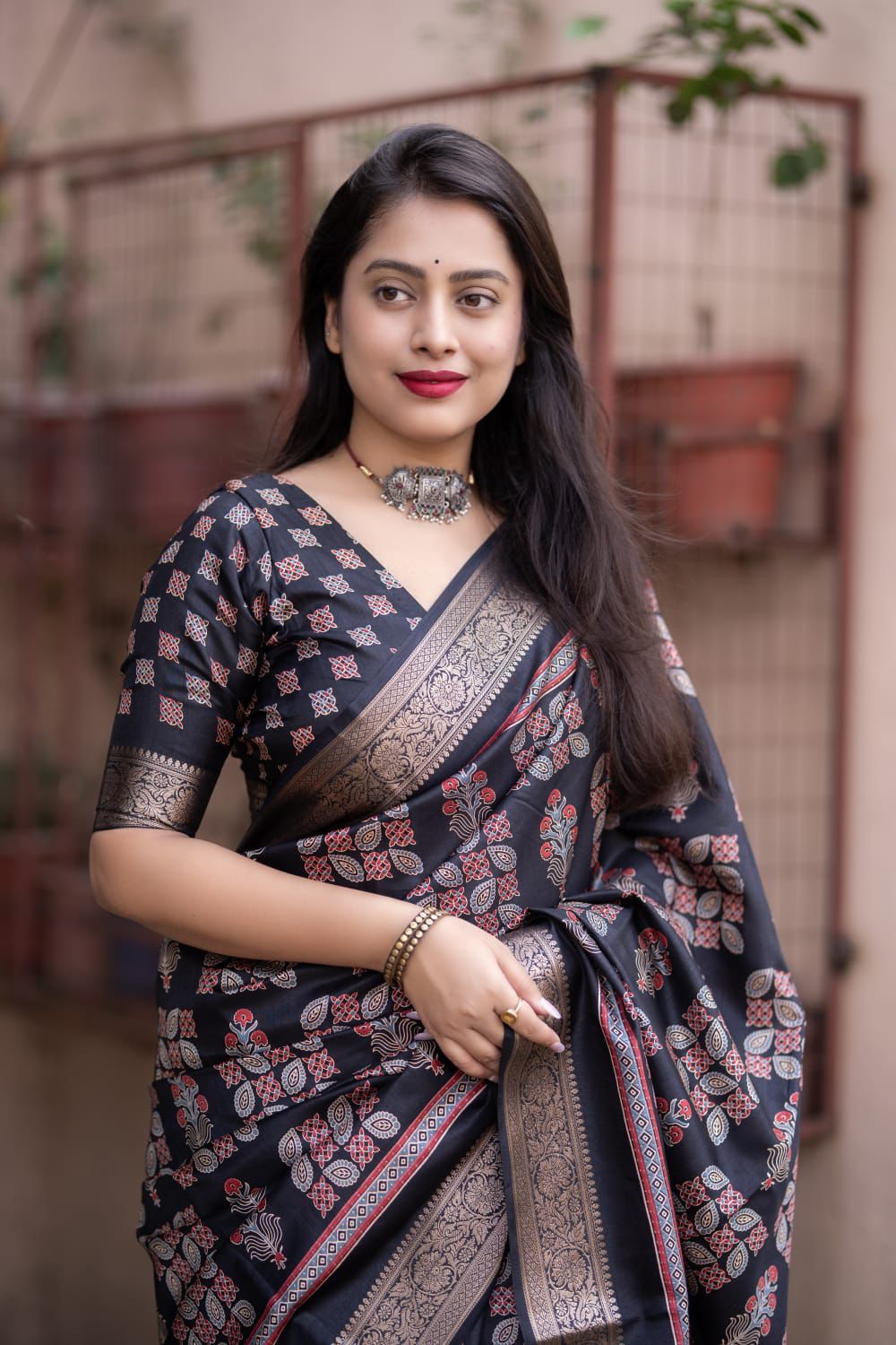 Black Soft Cotton Silk Ajrakh Printed With Gold Zari Border Saree