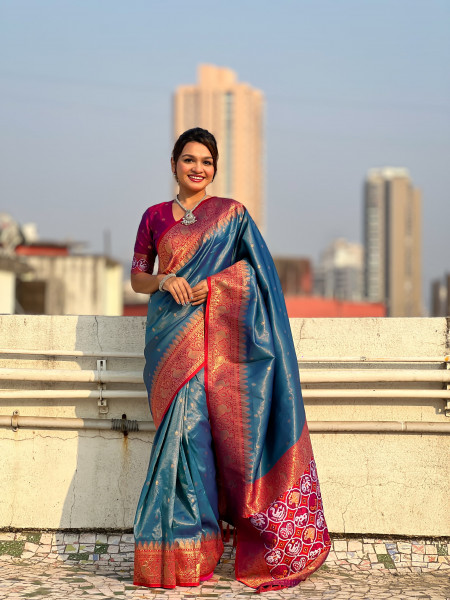 Image of Teal Pure Tissue Kanjivaram Rich Zari Weaved Body Patola Weaved Pallu Saree