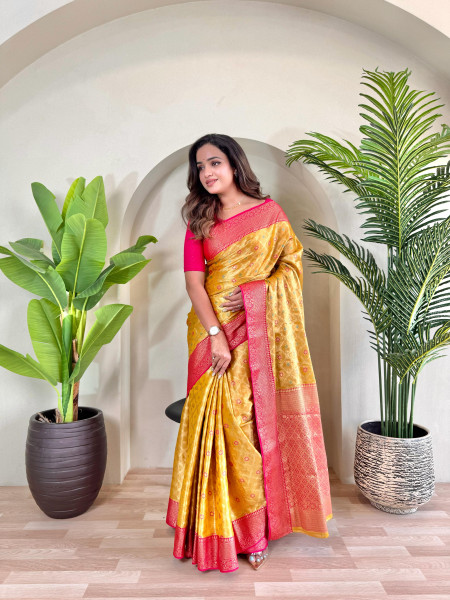 Image of Yellow Pure Tissue Silk Zari Meenakari Weaved Jaal Body Saree