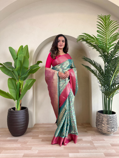 Image of Teal Pure Tissue Silk Zari Meenakari Weaved Jaal Body Saree