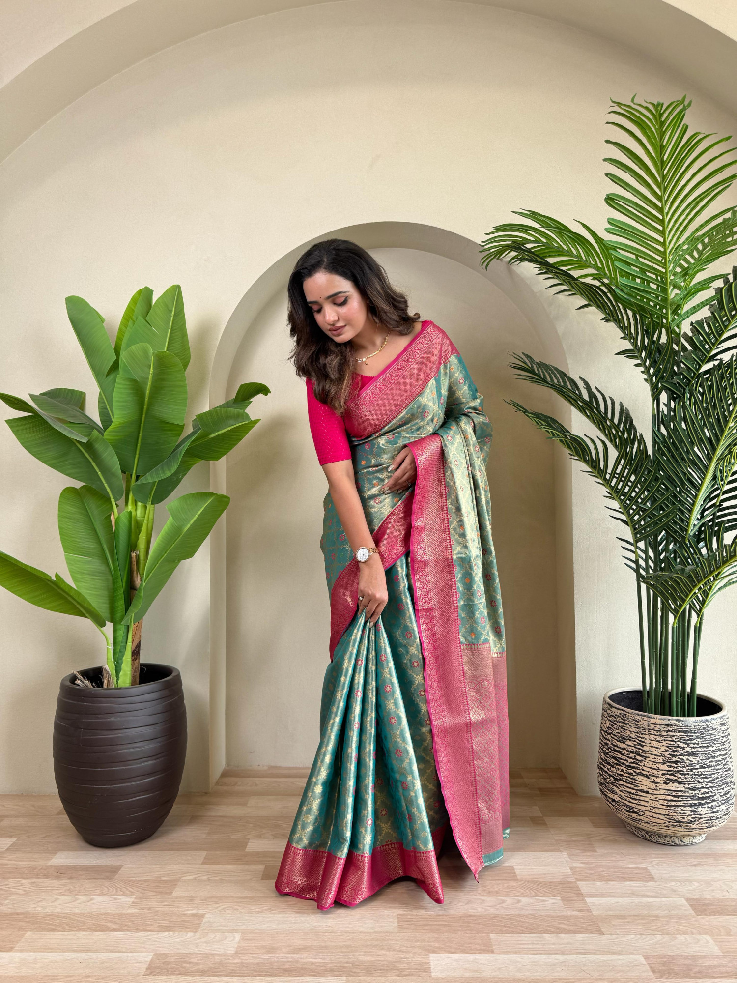 Teal Pure Tissue Silk Zari Meenakari Weaved Jaal Body Saree