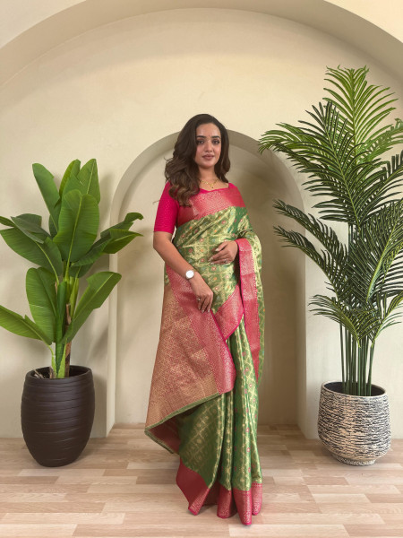 Image of Mehendi Green Pure Tissue Silk Zari Meenakari Weaved Jaal Body Saree