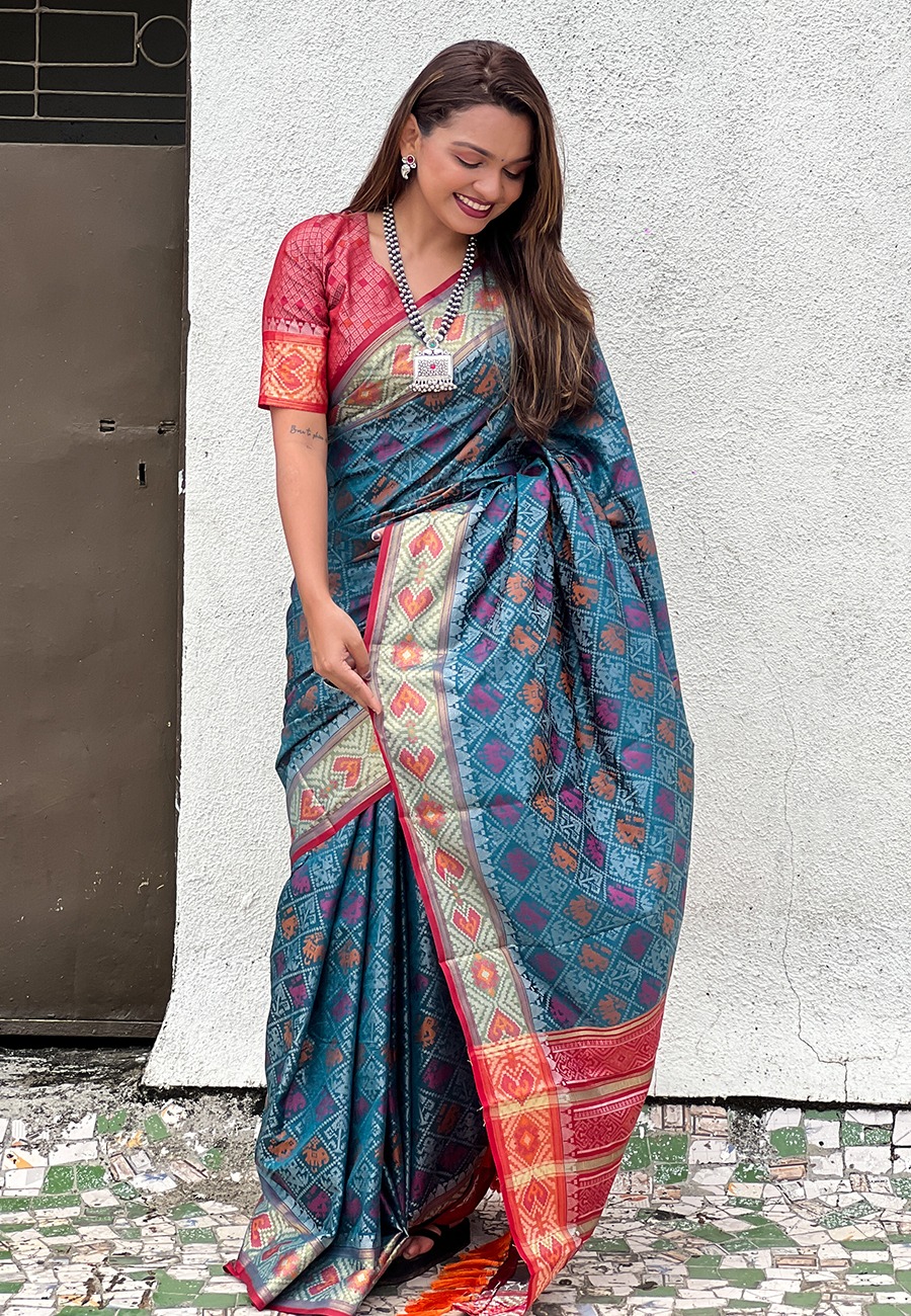Teal Patola Silk Multicolor Weaved All Over Meenakari Patola Border Saree