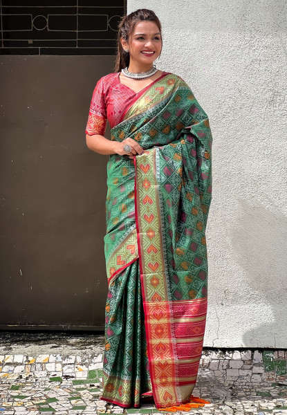 Image of Green Patola Silk Multicolor Weaved All Over Meenakari Patola Border Saree