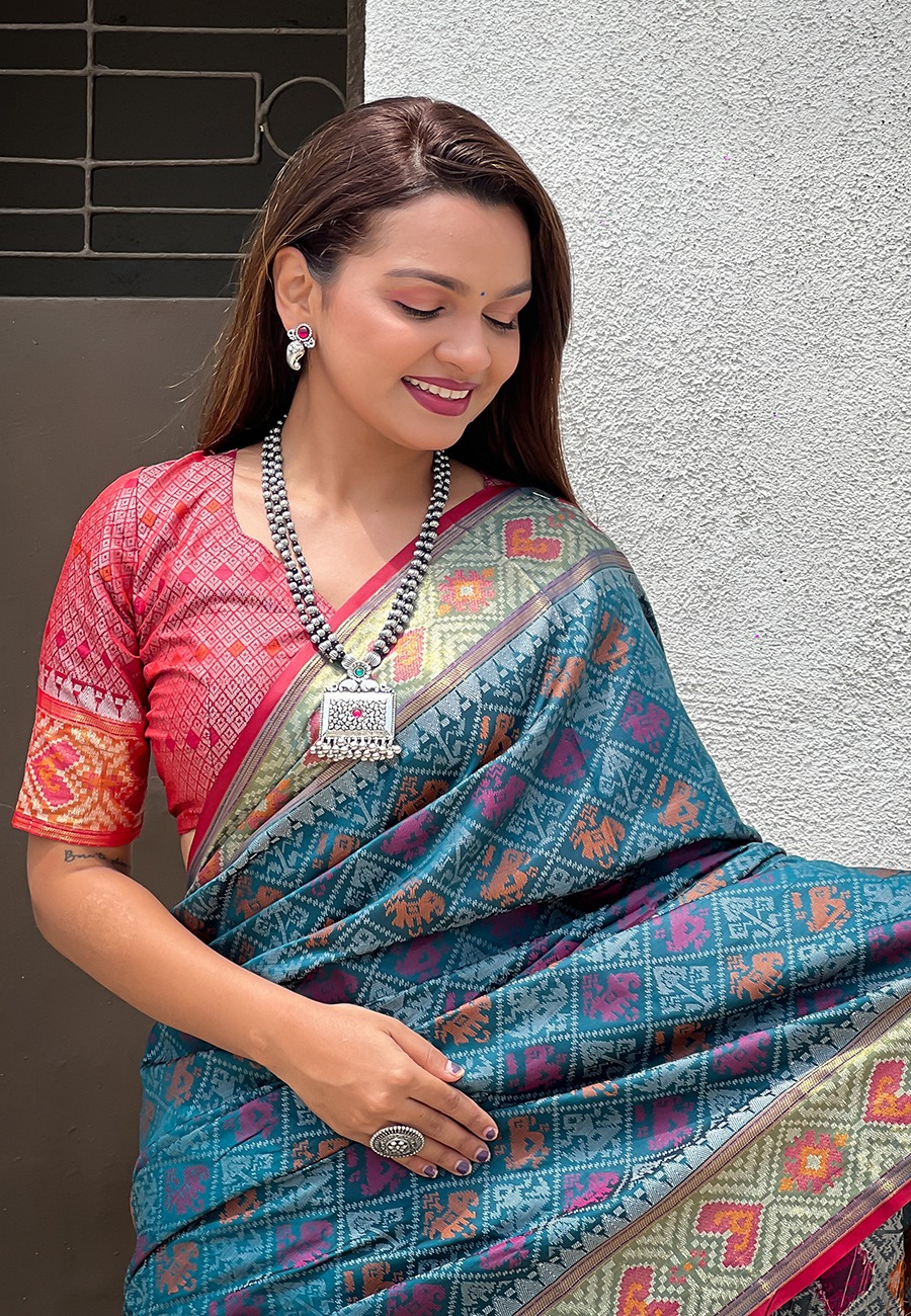 Teal Patola Silk Multicolor Weaved All Over Meenakari Patola Border Saree