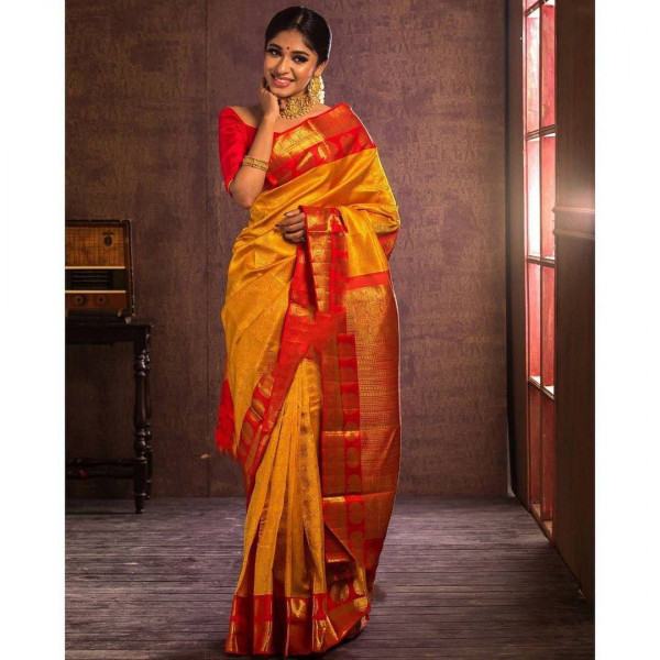 Image of Mustard Pure Banarasi Silk Rich Zari Weaved Contrast Red Pallu Border Saree
