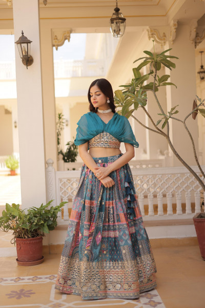 Image of Teal Multi Russian Silk Printed Cum Embroidery Stitched Lehenga