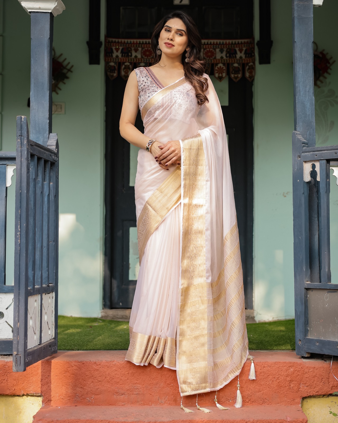 Ivory White Chhifon Self Weaved Motifs With Golden Zari Pallu Border Saree