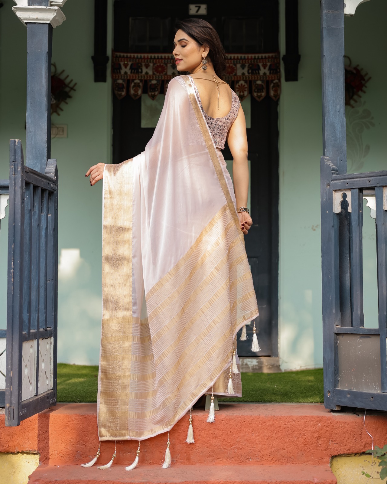 Ivory White Chhifon Self Weaved Motifs With Golden Zari Pallu Border Saree