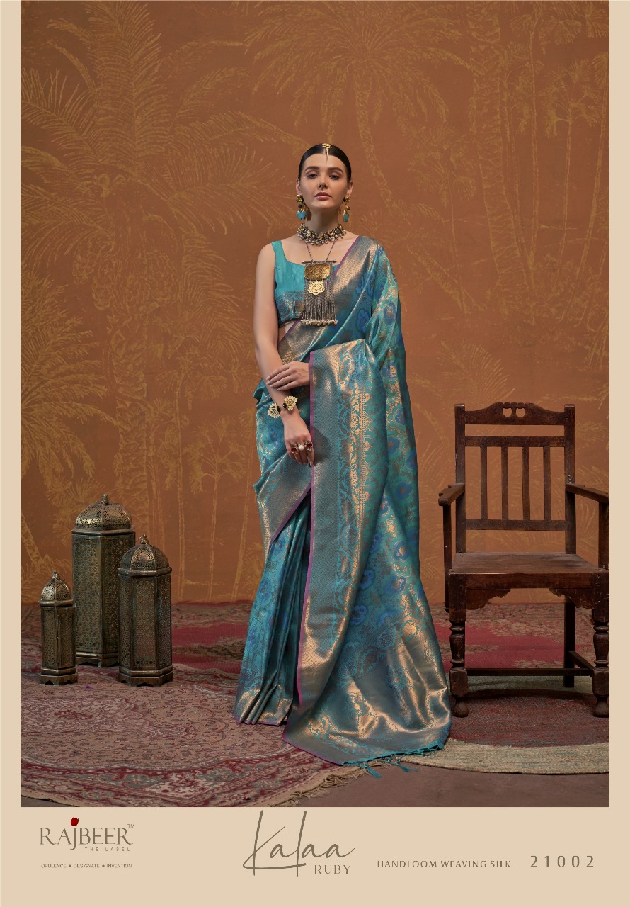 Teal Pure Banarasi Silk Rich All Over Zari Weaved Saree With Tassels On Pallu