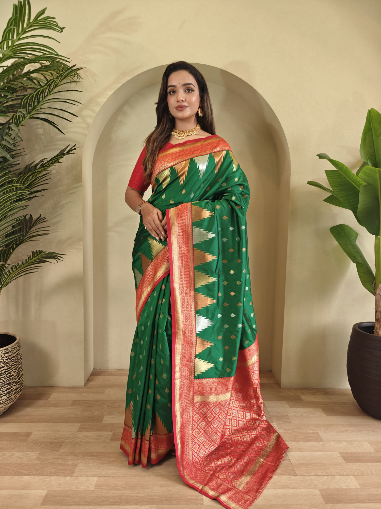 Bottle Green Kanchipuram Silk Dual Zari Weaved All Over Rich Pallu Temple Border Saree