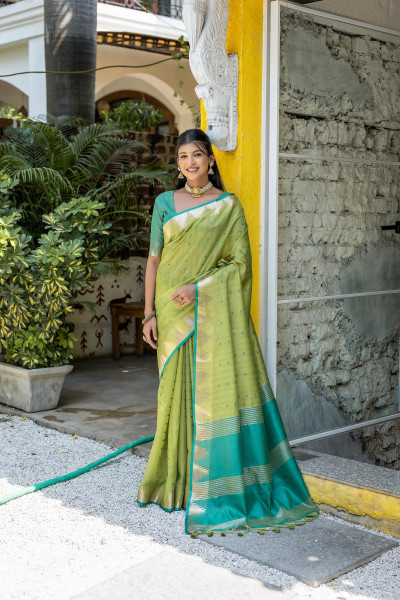 Image of Green Tussar Silk All Over Zari Booti Weaved Stripes Pallu Temple Border Saree