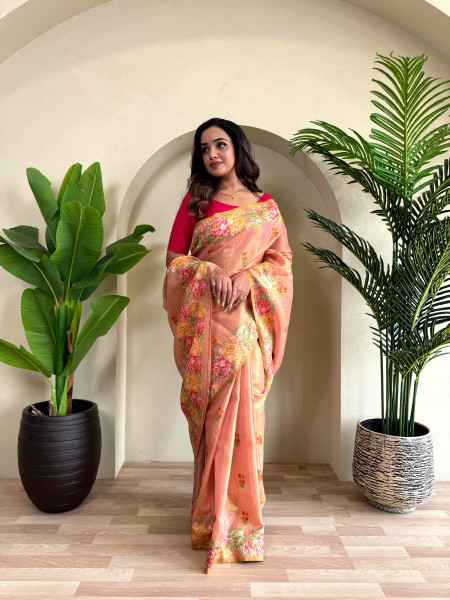Image of Peach Tissue Silk Jacquard Weaved Rich Zari Pallu Beautiful Motifs  Border Saree