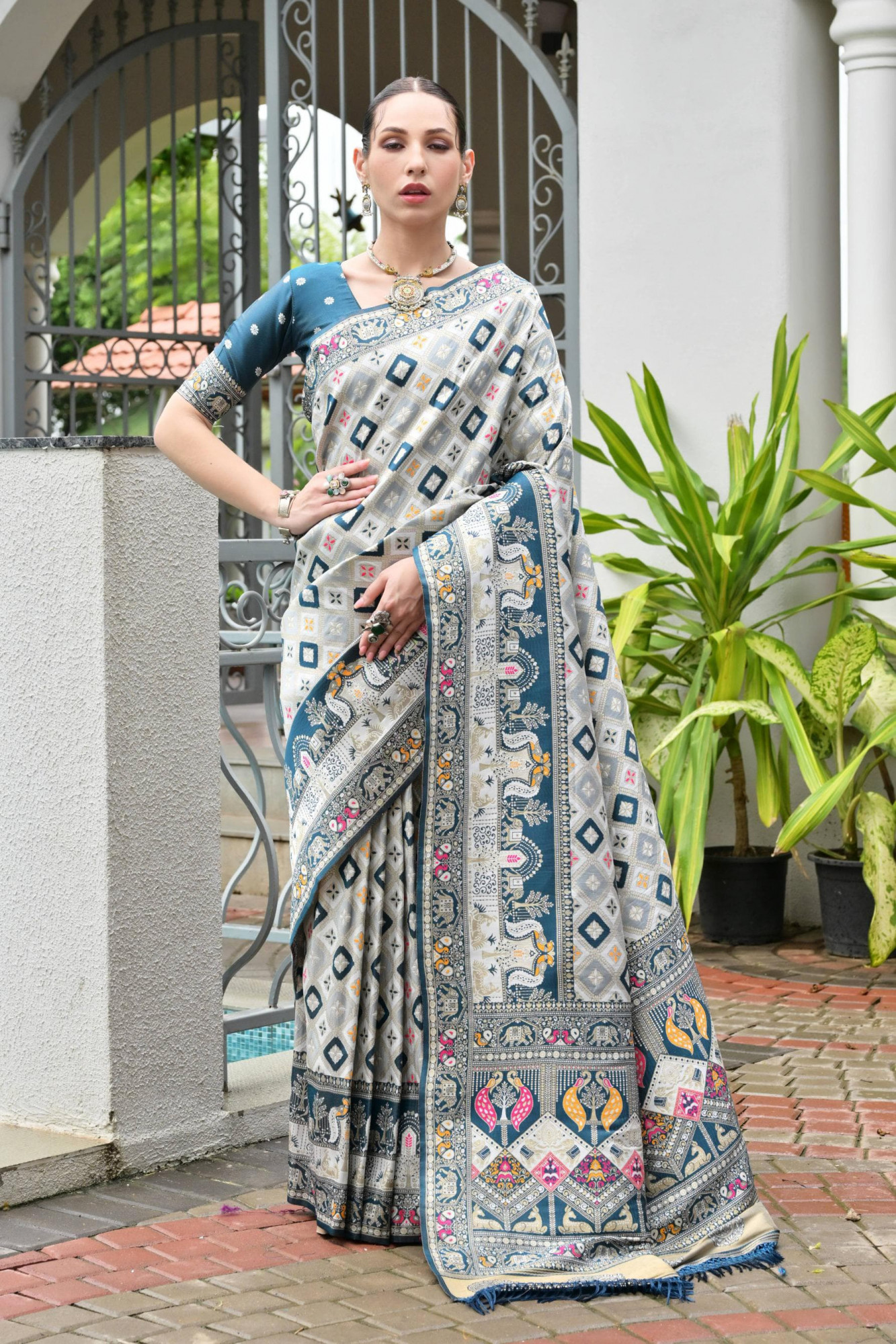 Off White Teal Premium Banarasi Patola Ajrakh Weaved Saree