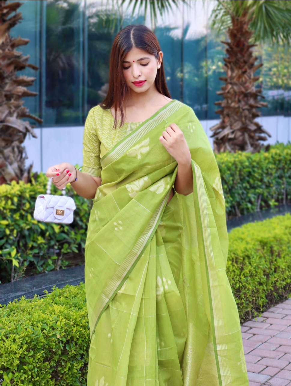 Pure Linen Silver Zari Weaved Saree With Tassels