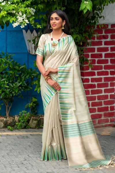 Image of Pure Tussar Silk Ikkat Woven Border Saree With Tassels