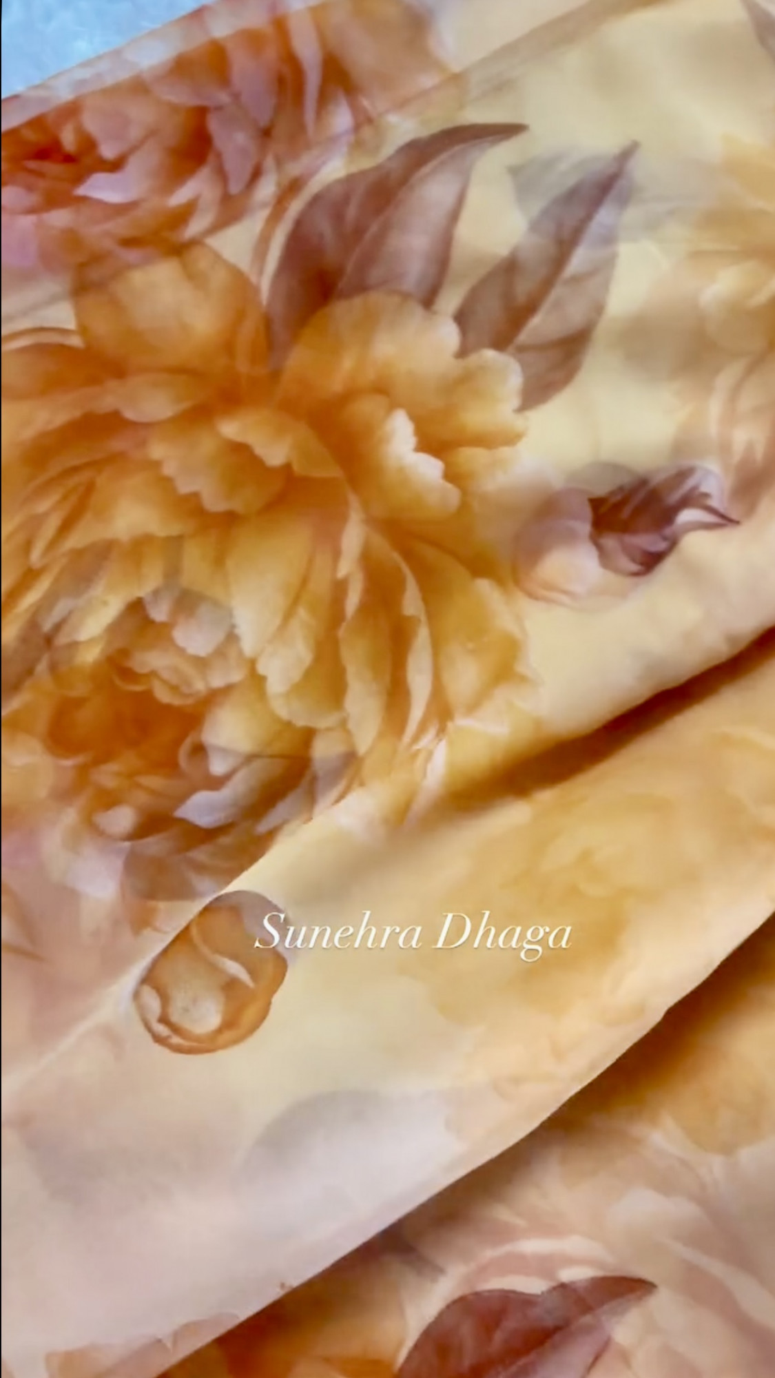 SHARBATI- Dusty Peach Orange Floral Georgette Saree