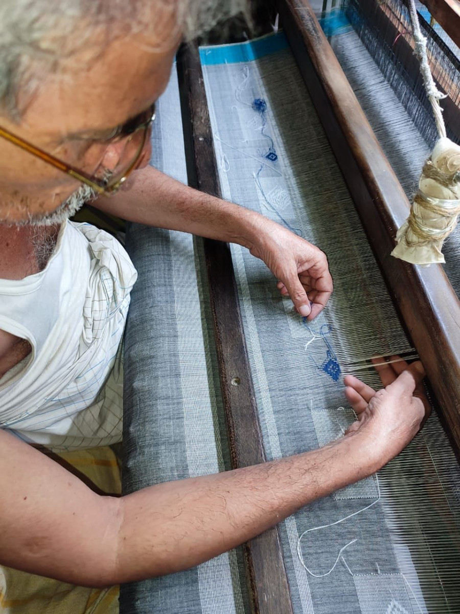 Our weavers preserving the handwoven elegance