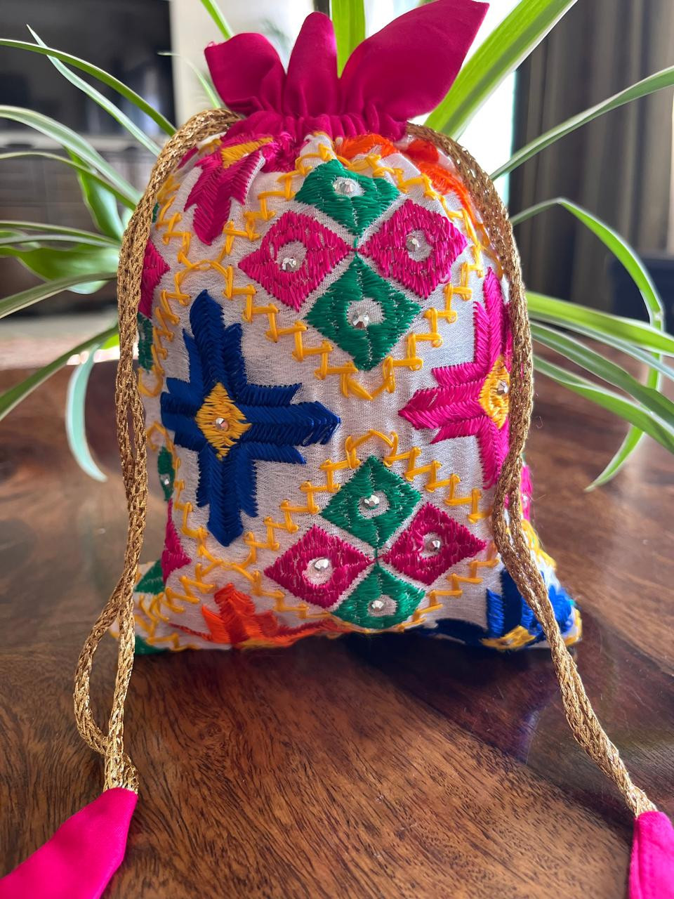 Beautiful hand embroidered cotton Phulkari Potli