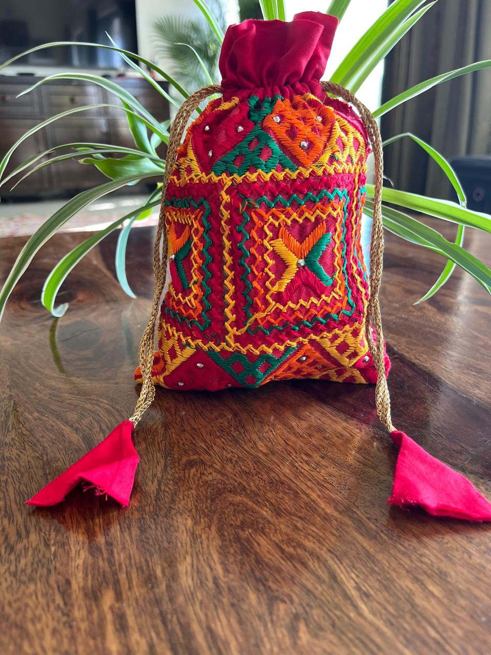 Beautiful hand embroidered cotton Phulkari Potli