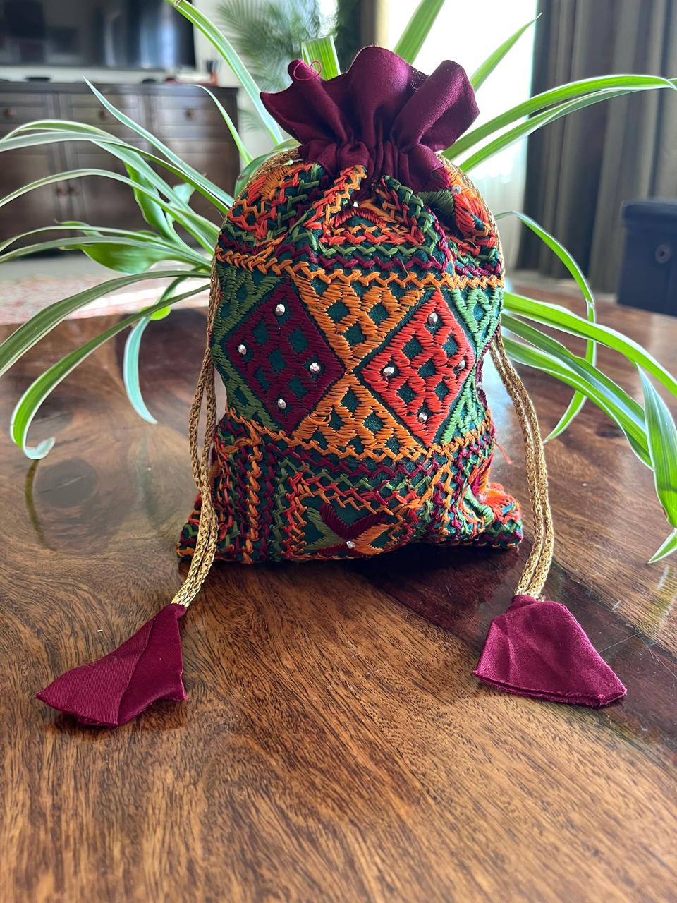 Beautiful hand embroidered cotton Phulkari Potli