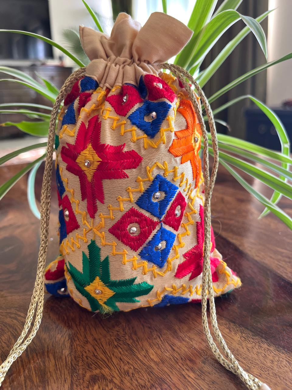 Beautiful hand embroidered cotton Phulkari Potli