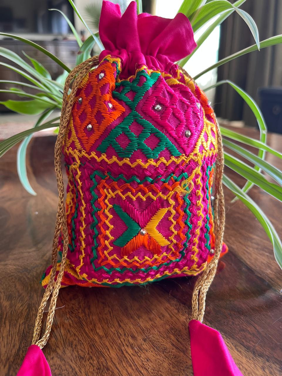 Beautiful hand embroidered cotton Phulkari Potli