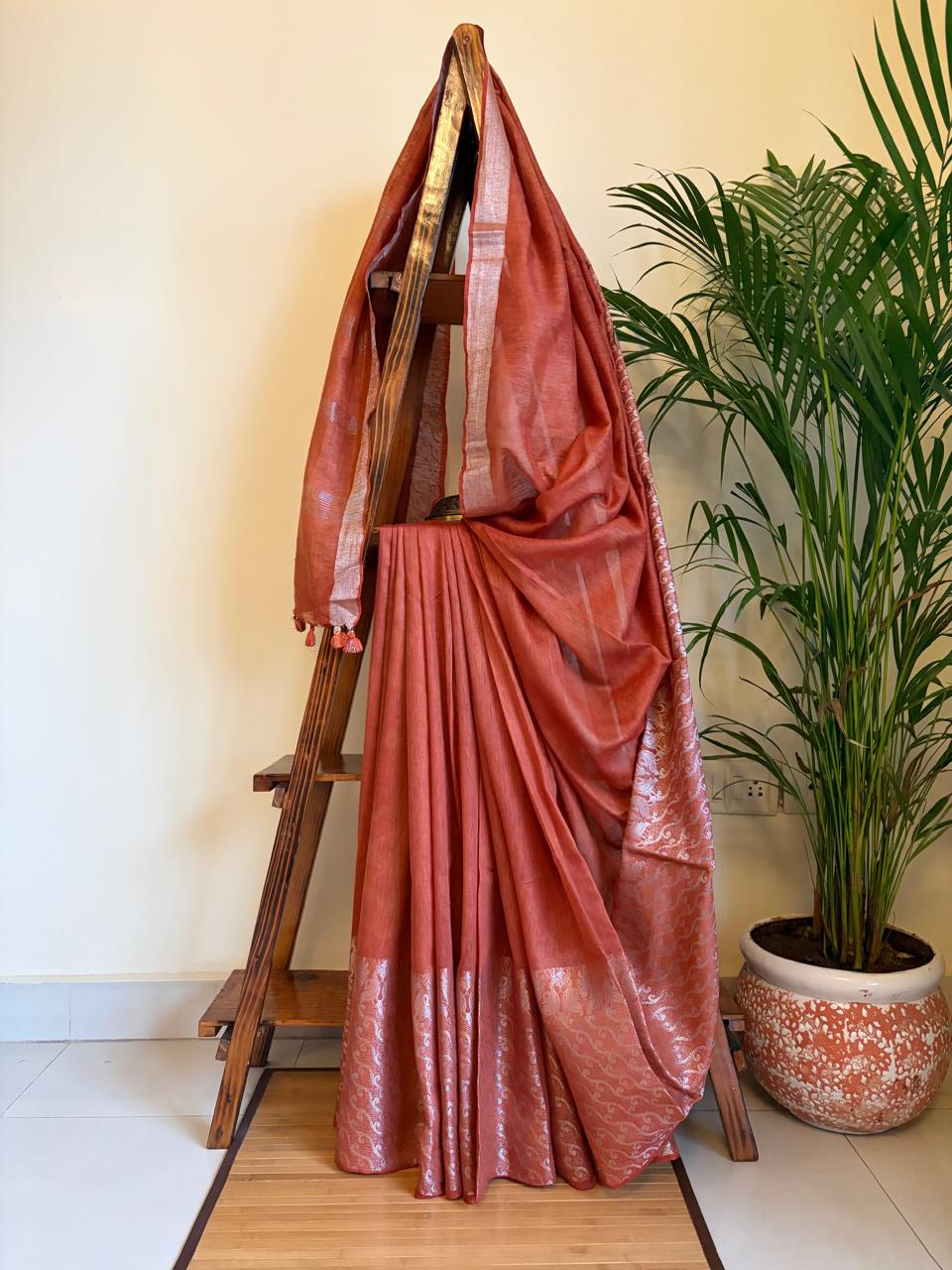 Beautiful handloom festive linen saree with intricate zari border - Rust Red
