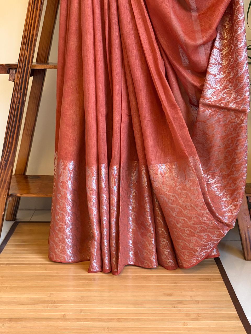 Beautiful handloom festive linen saree with intricate zari border - Rust Red
