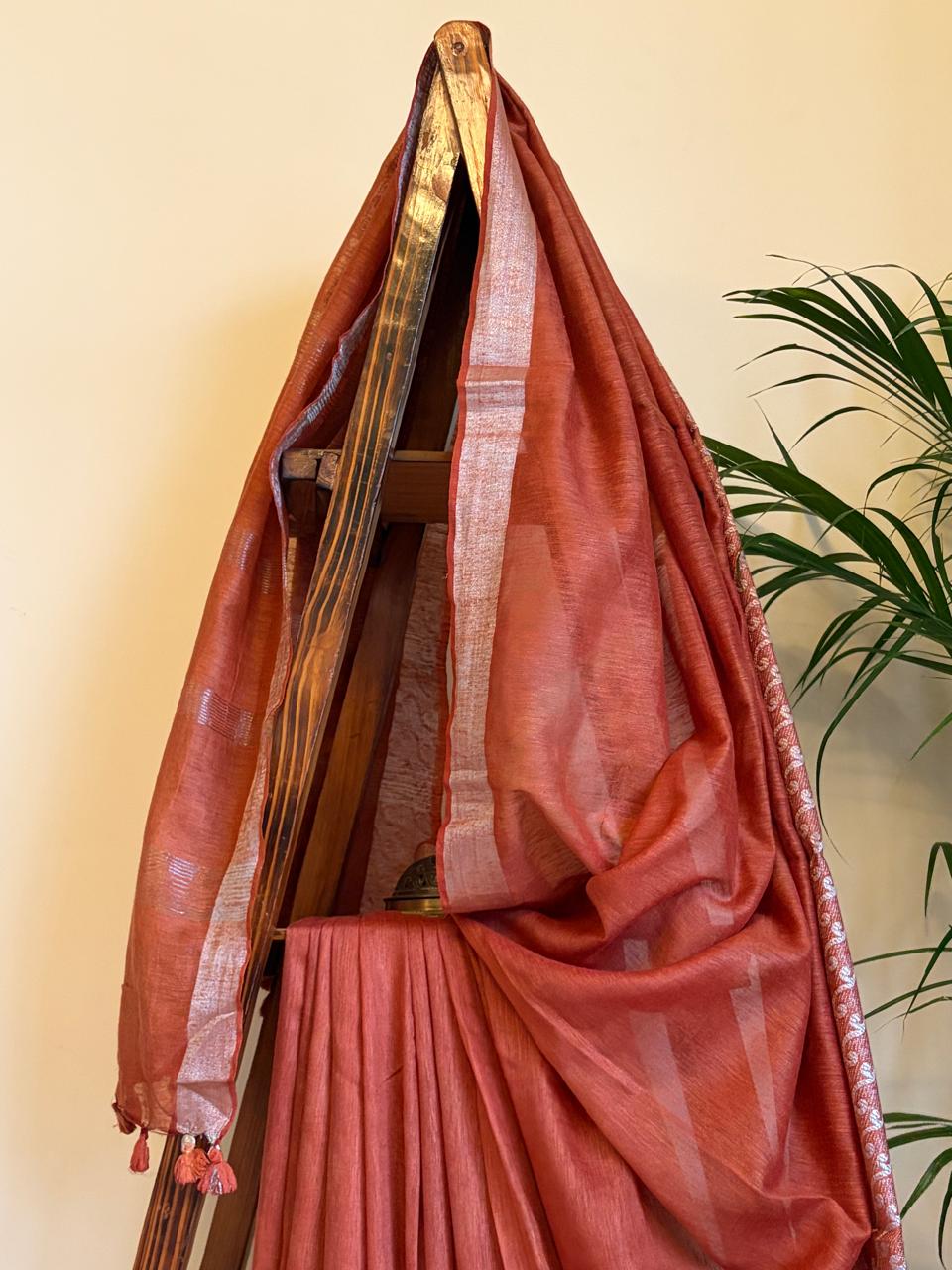 Beautiful handloom festive linen saree with intricate zari border - Rust Red