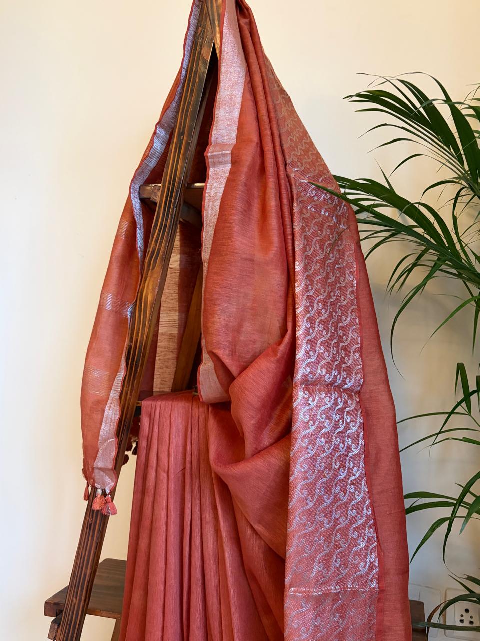 Beautiful handloom festive linen saree with intricate zari border - Rust Red