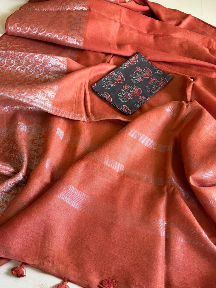 Image of Beautiful handloom festive linen saree with intricate zari border - Rust Red
