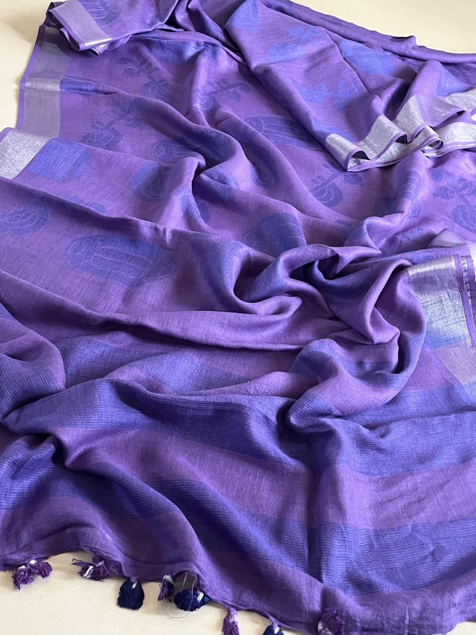 Beautiful handwoven Linen Saree with musical instruments - Purple
