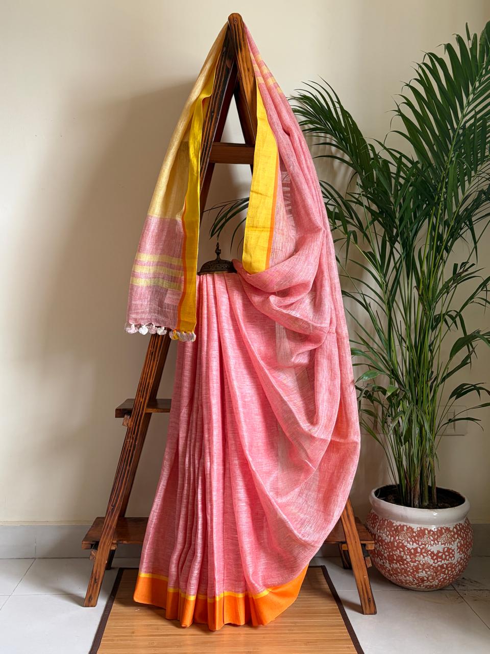 Handwoven Pastel Pink Linen Saree with tassels