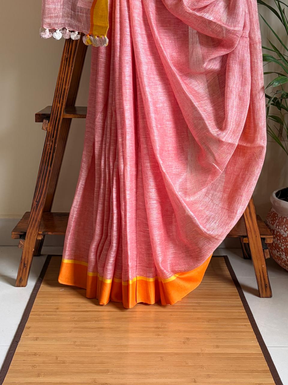 Handwoven Pastel Pink Linen Saree with tassels