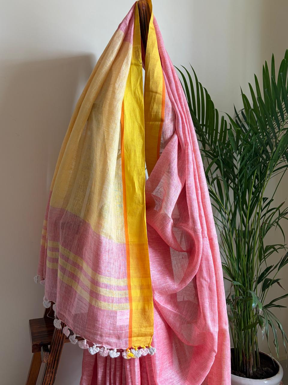 Handwoven Pastel Pink Linen Saree with tassels