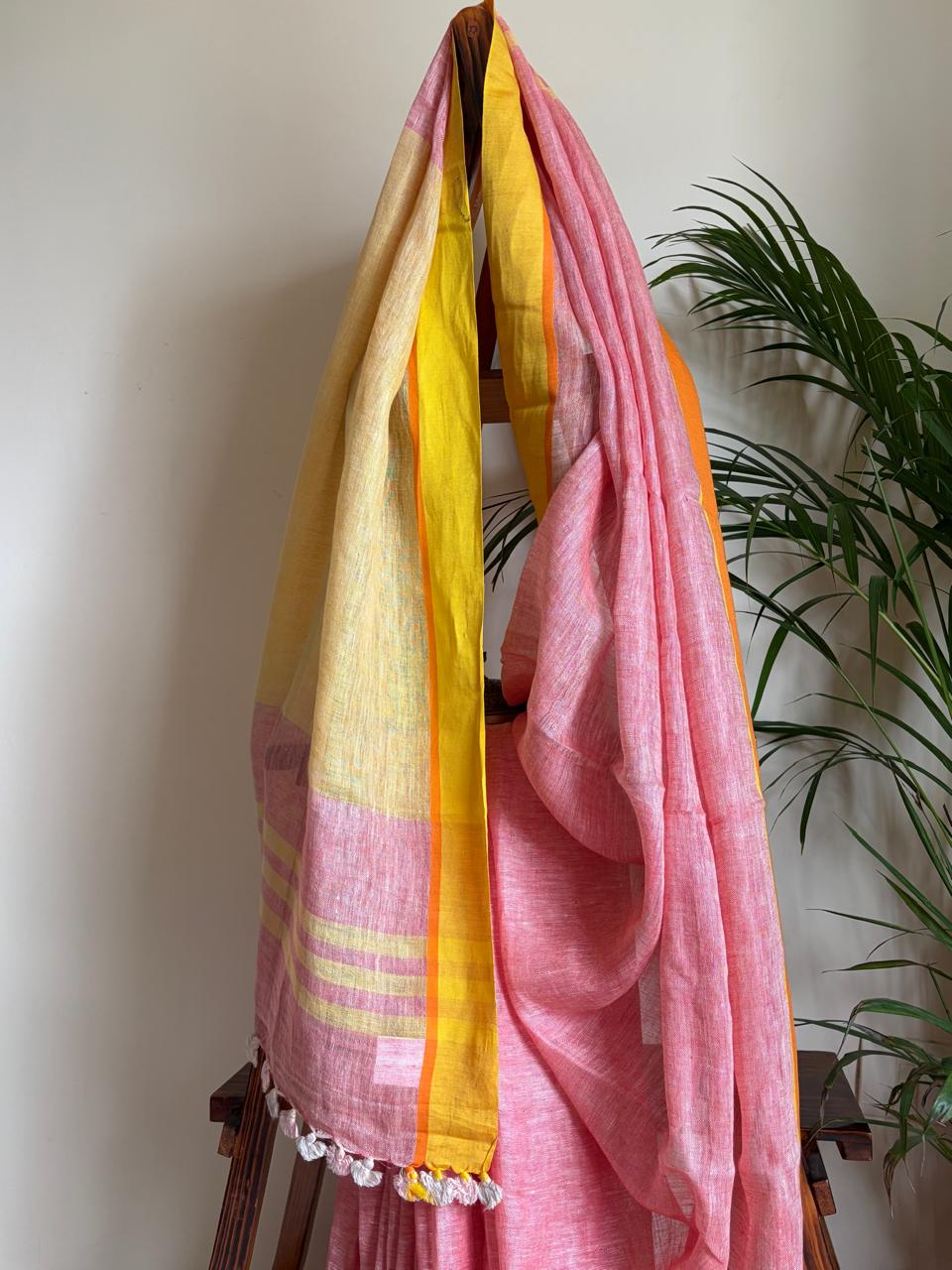 Handwoven Pastel Pink Linen Saree with tassels