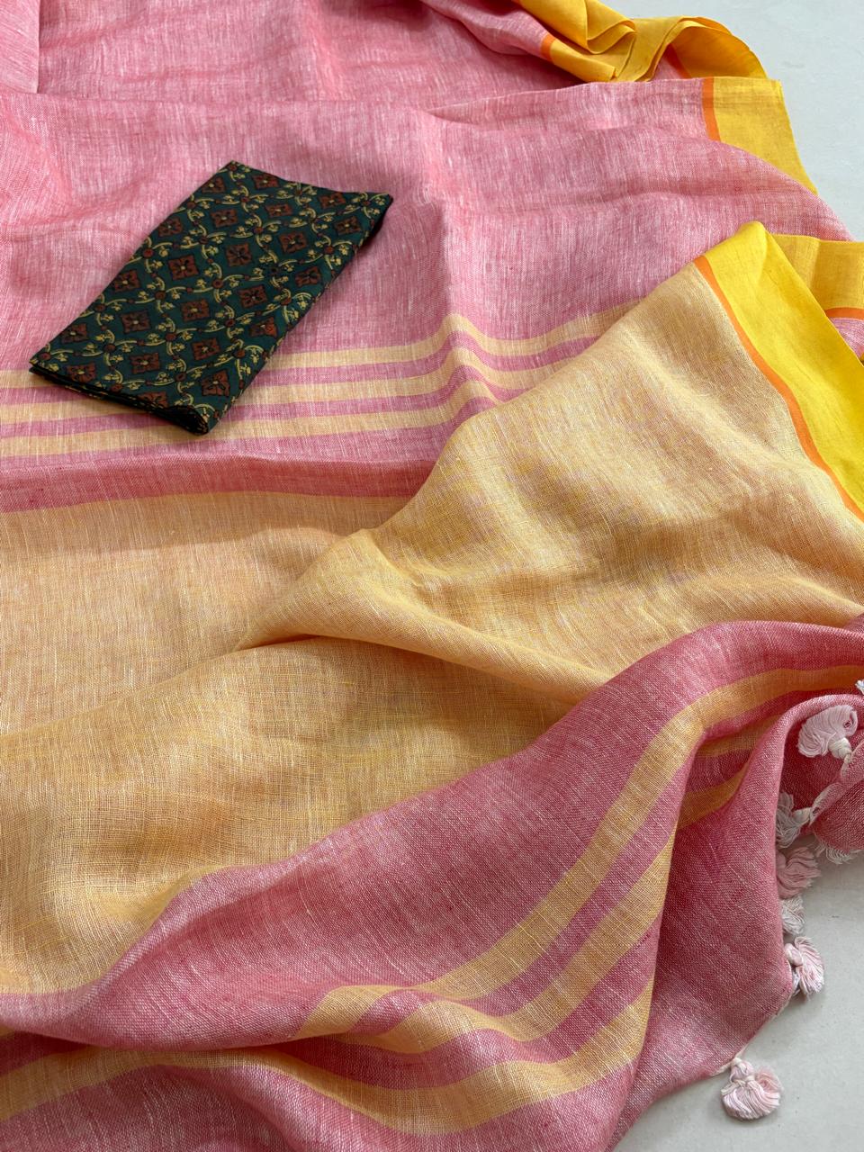 Handwoven Pastel Pink Linen Saree with tassels