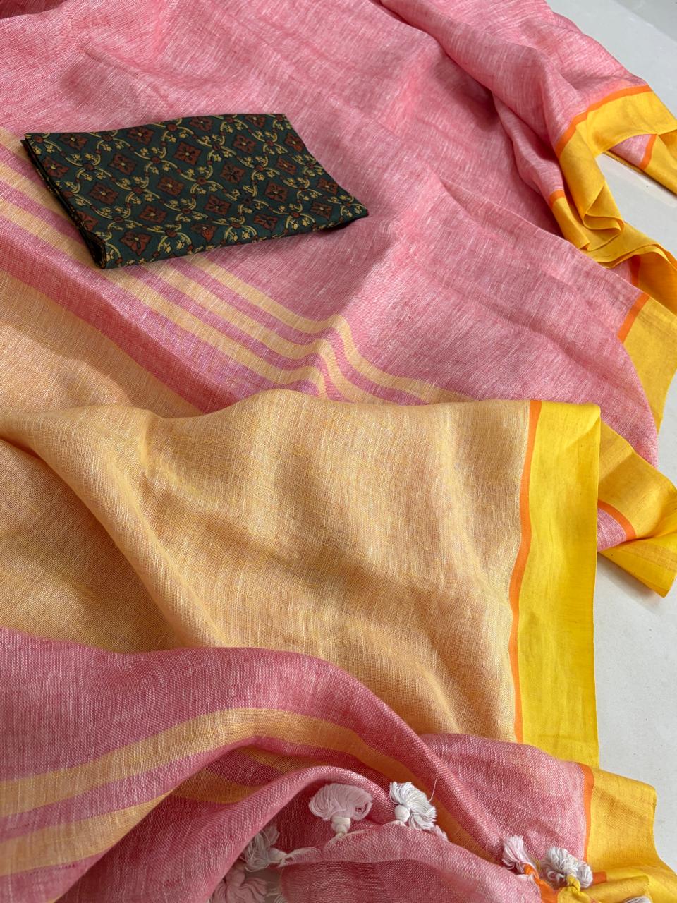 Handwoven Pastel Pink Linen Saree with tassels
