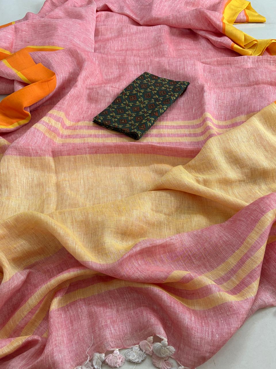 Handwoven Pastel Pink Linen Saree with tassels