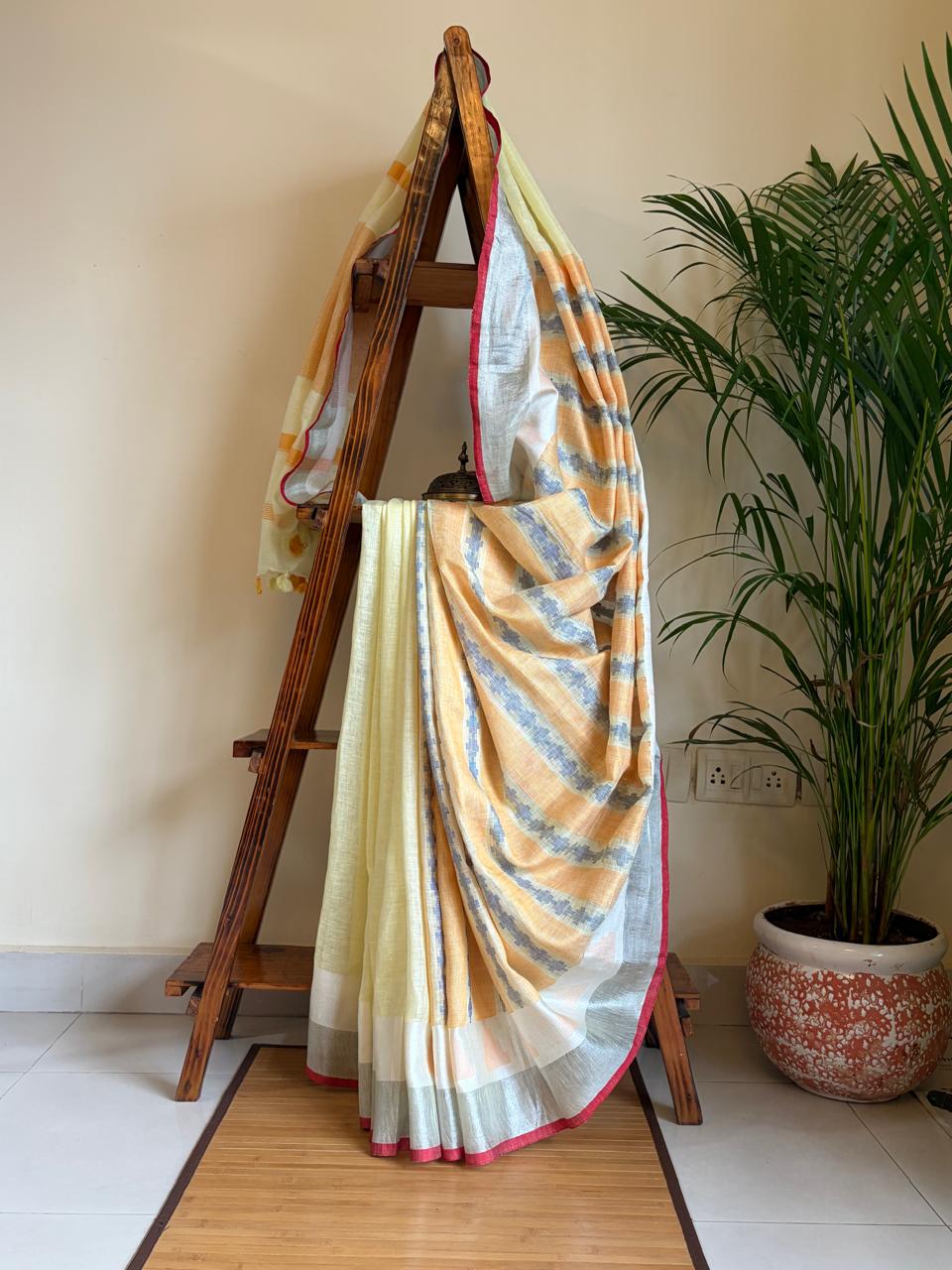 100 Handwoven Linen saree with tassels - Pastel Yellow