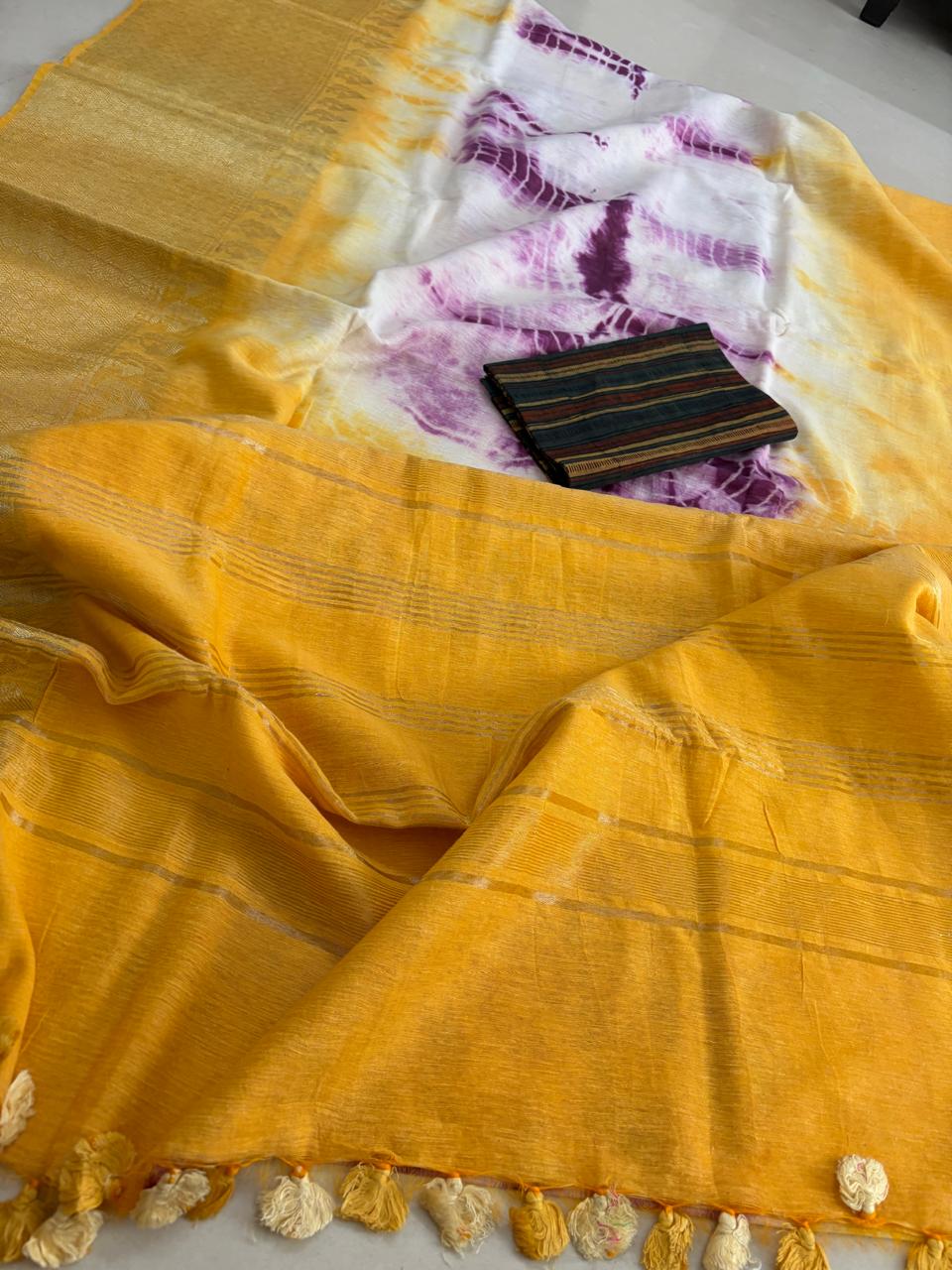 Beautiful handloom festive linen saree with intricate zari border - Yellow and Purple