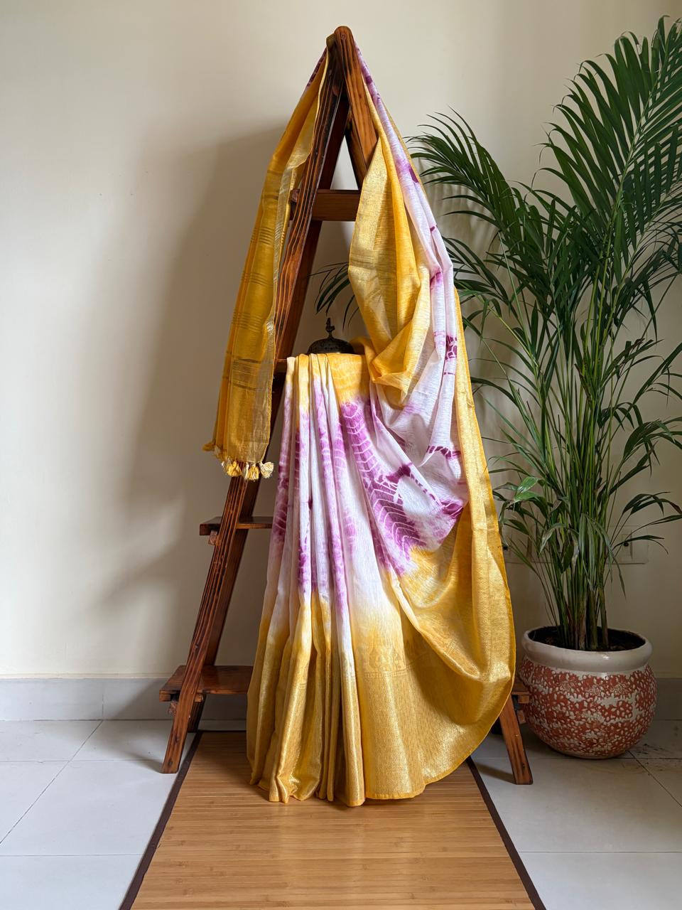 Beautiful handloom festive linen saree with intricate zari border - Yellow and Purple
