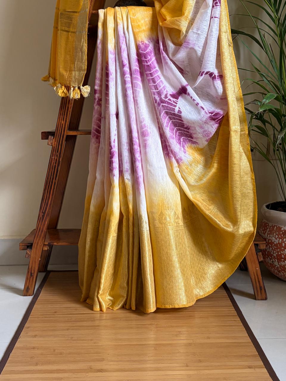Beautiful handloom festive linen saree with intricate zari border - Yellow and Purple