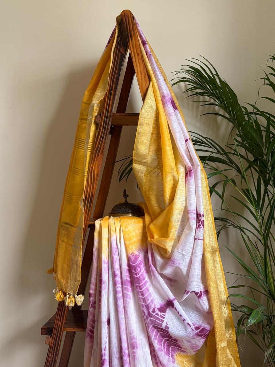 Beautiful handloom festive linen saree with intricate zari border - Yellow and Purple