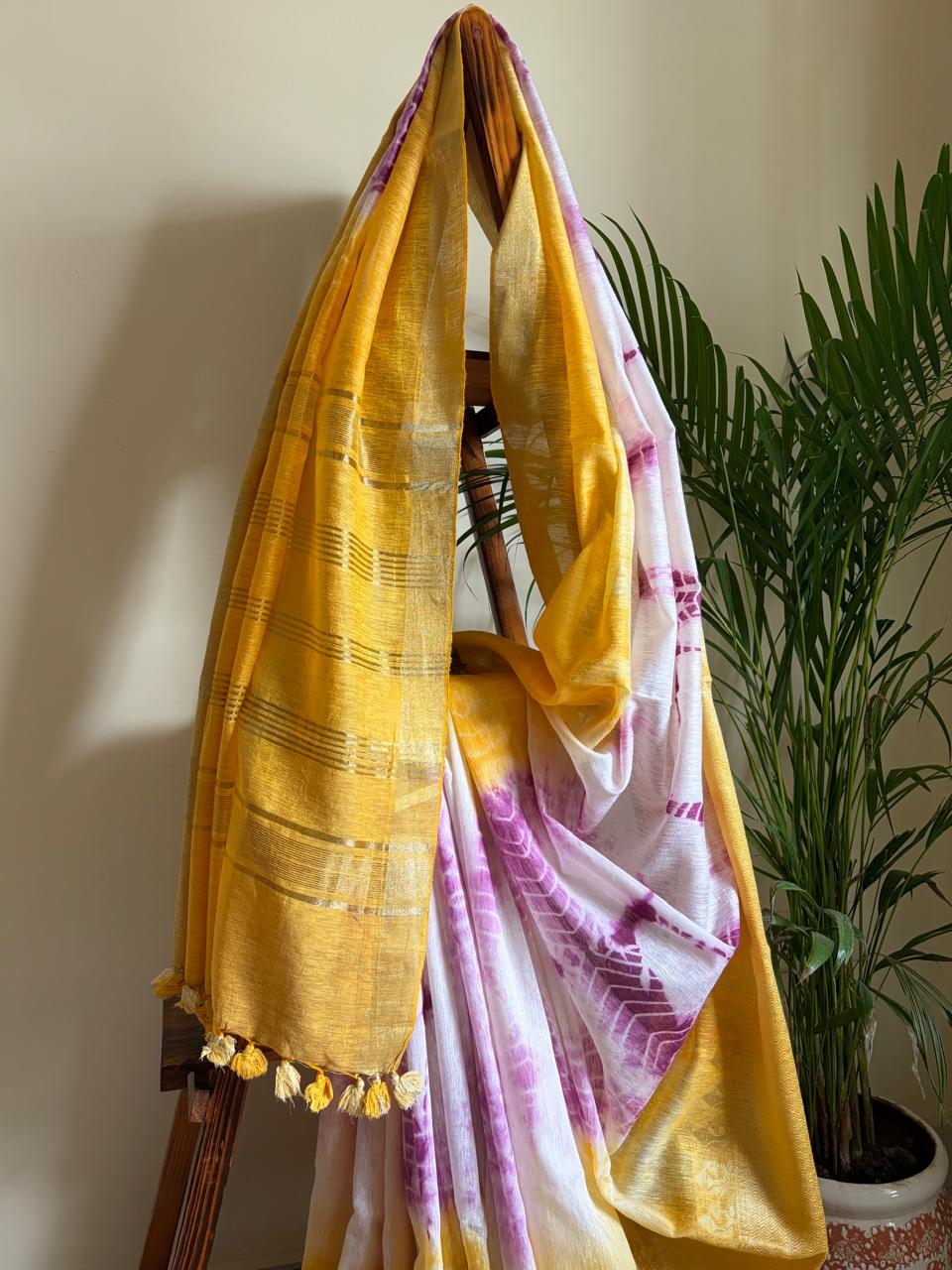 Beautiful handloom festive linen saree with intricate zari border - Yellow and Purple
