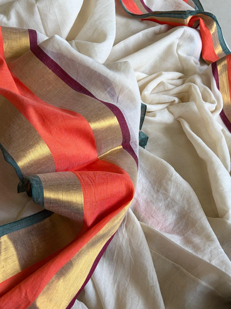 Soft and comfortable Pure Mul Mul Saree - Off white with Orange
