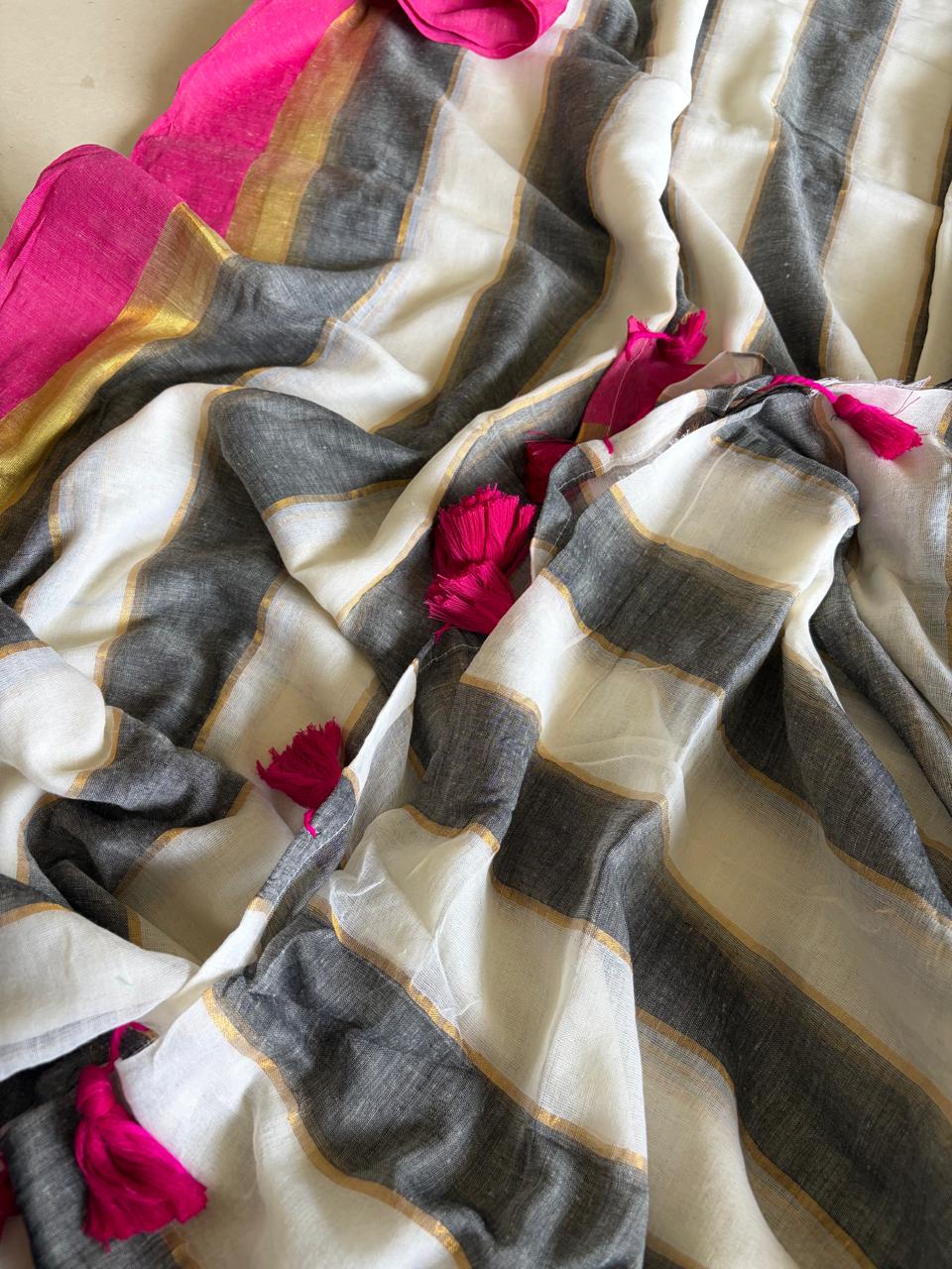 Soft and comfortable Pure Mul Mul Striped Saree - Grey with Pink